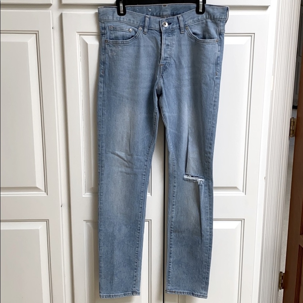 Men’s ripped blue jeans